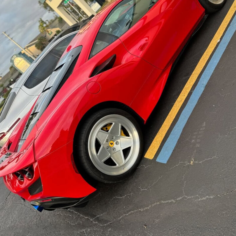 7C Wheels on red Ferrari 458, side profile detail